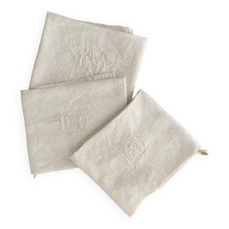 3 large white tea towels in cotton damask thread with MD monogram.