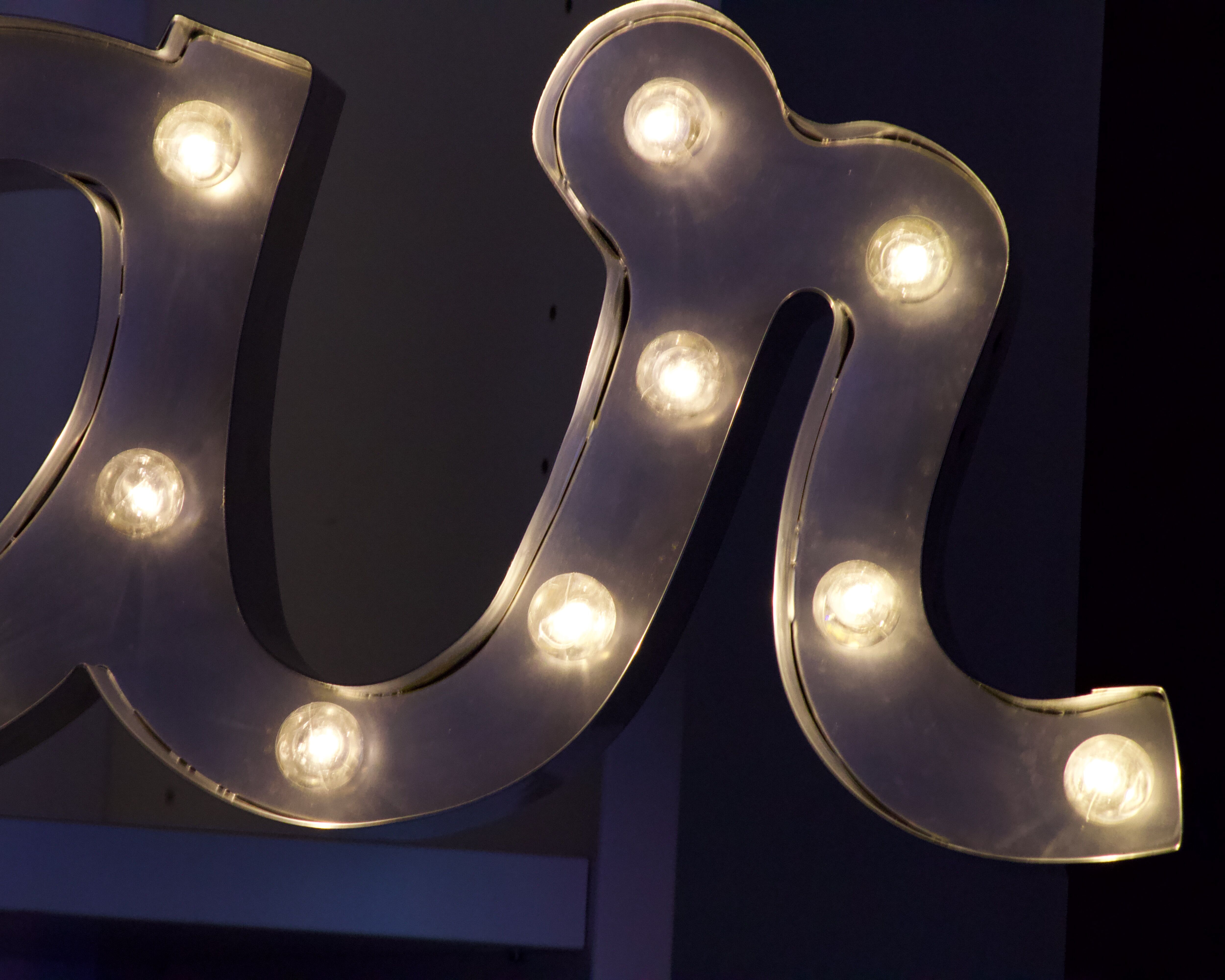Ancient Light Sign in aluminium lettering forming the word "BAR"