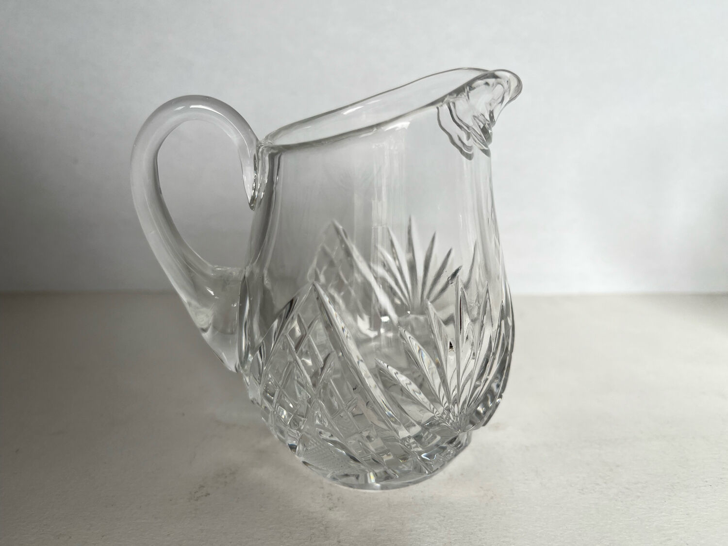 2 crystal pitchers