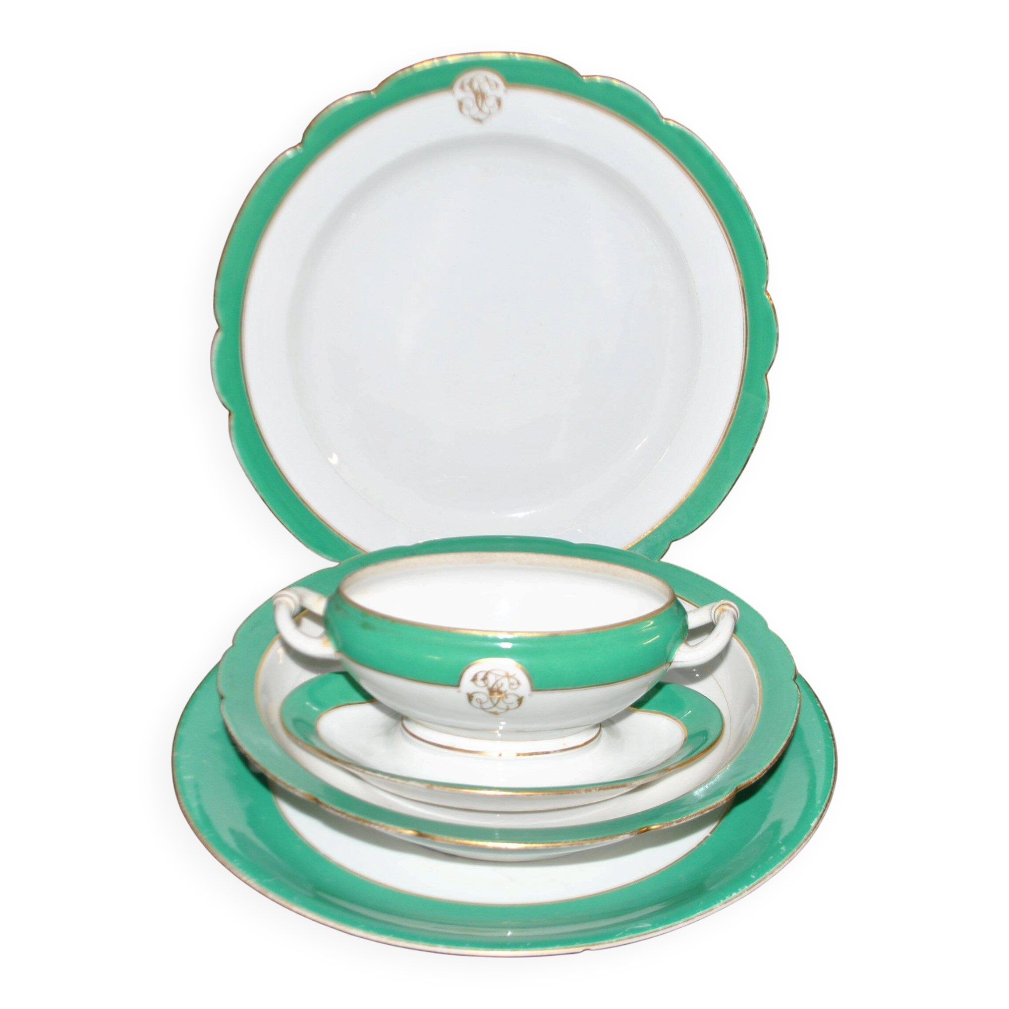 Paris porcelain set of 3 plates and a sauce boat with green border and gold monogram JC.