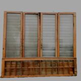 Suite de quatre portes de séparation en chêne massif XXe siècle