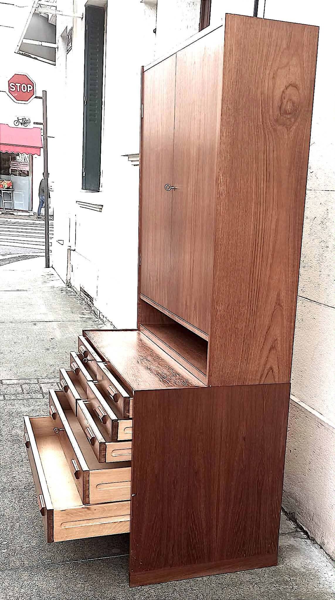 Double teak cabinet from the 1950s by Hans Wegner for RY Mobler, height 180 cm.