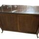 Louis XV style chest of drawers with curved Venetian doors in mahogany and gilded wood