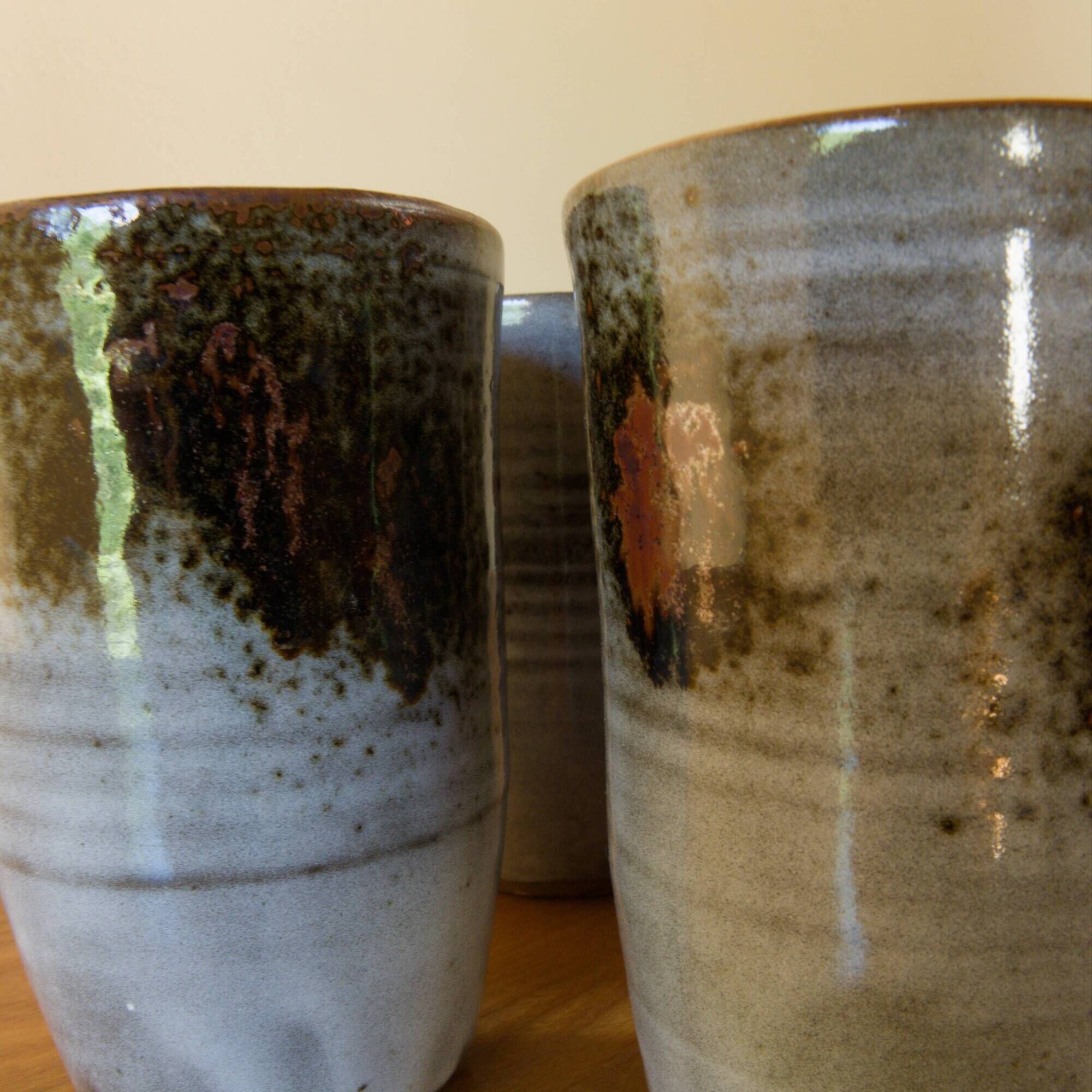 Set of 4 glazed stoneware mugs signed by Thierry and Chantal Robert.