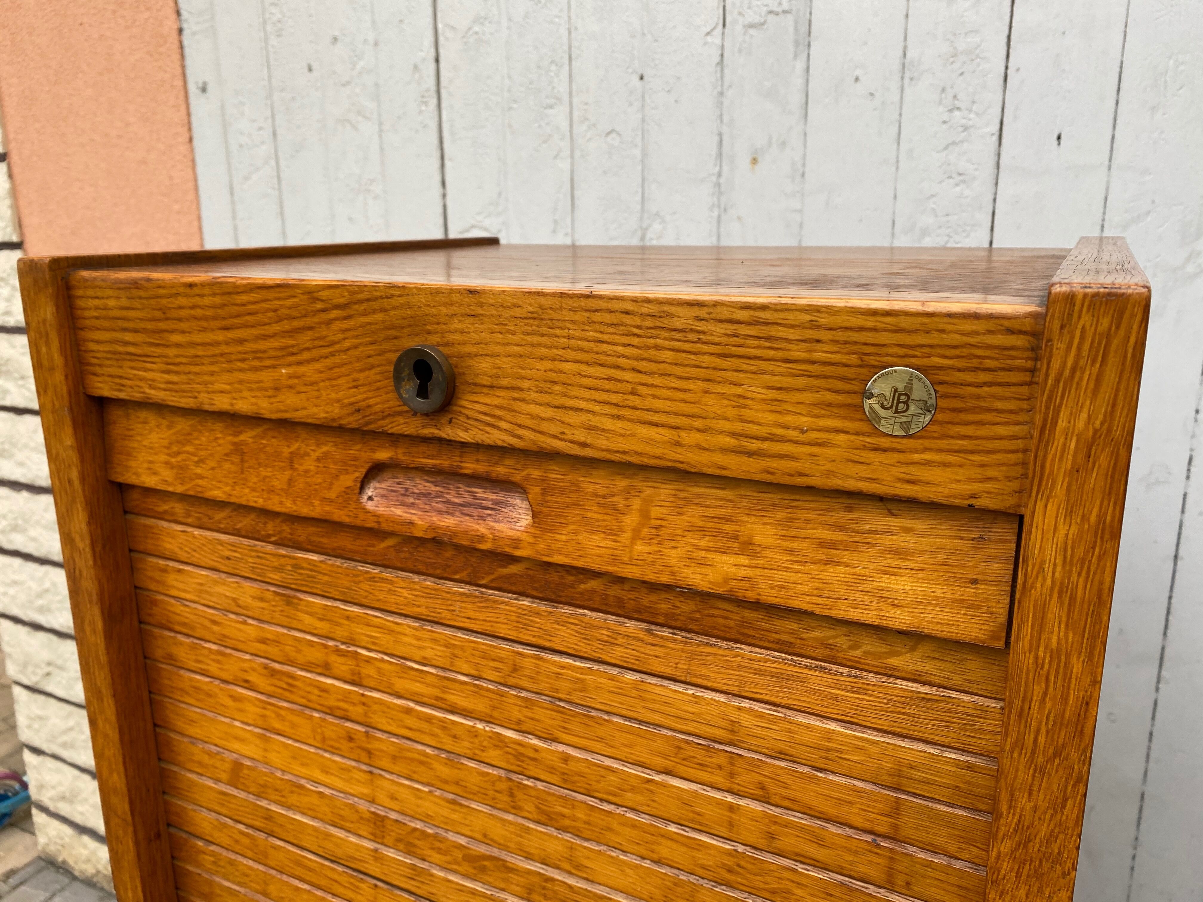 Industrial furniture notary binder with vintage j-b curtain 1960s