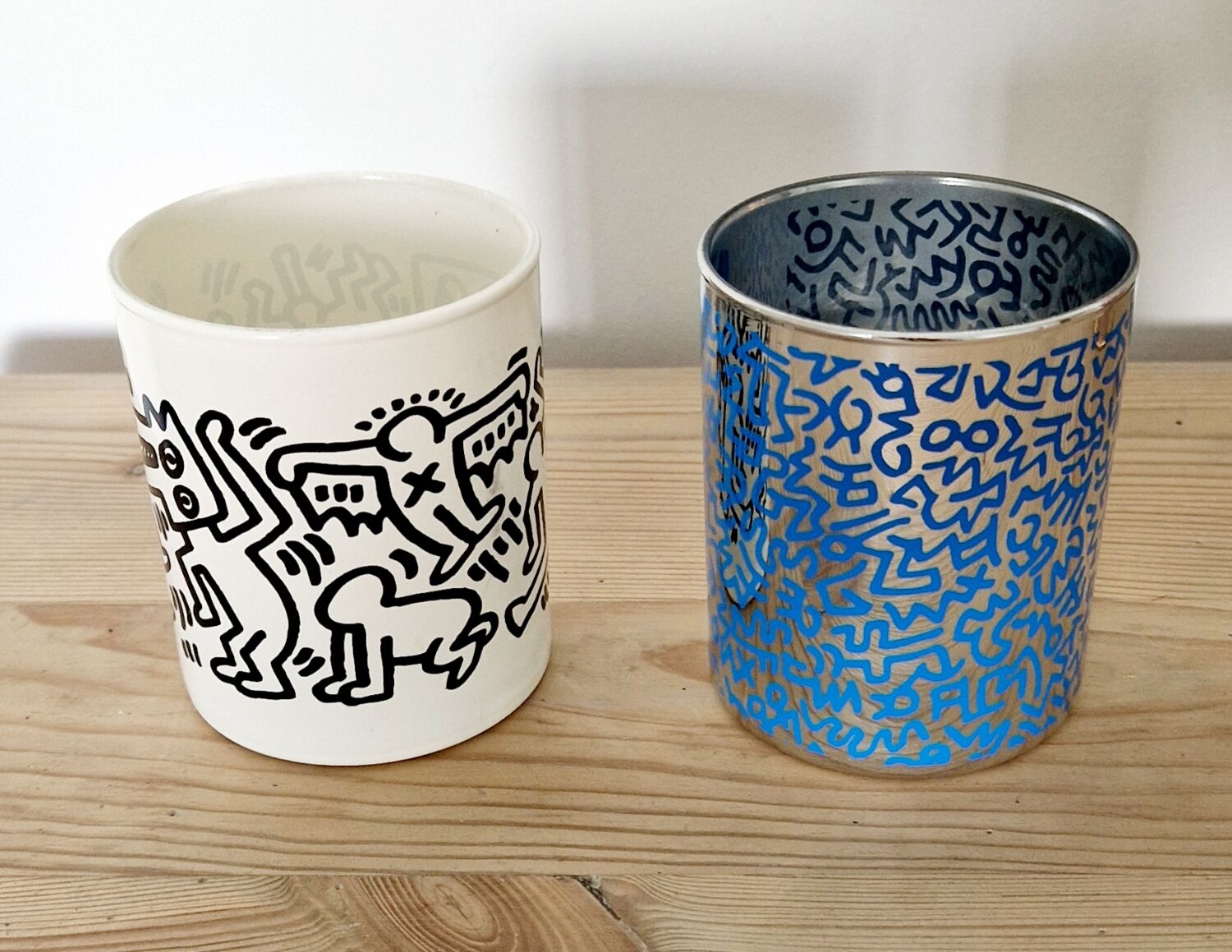Pair of Keith Haring pots in opaline.
