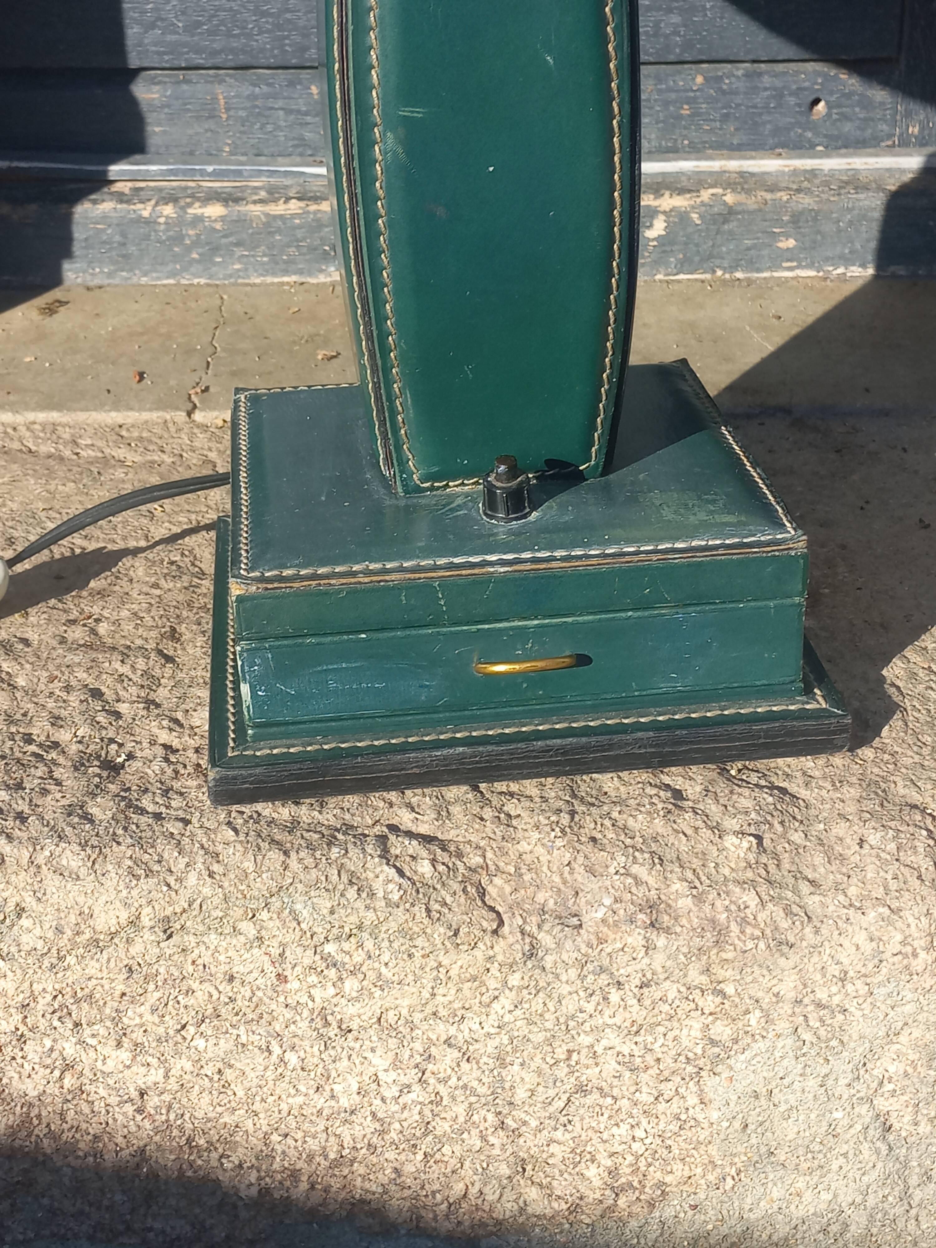 Vintage leather desk lamp with saddle stitching from the 1960s.