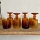 8 mismatched vintage amber glasses