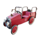 Old pedal car in tole fire truck