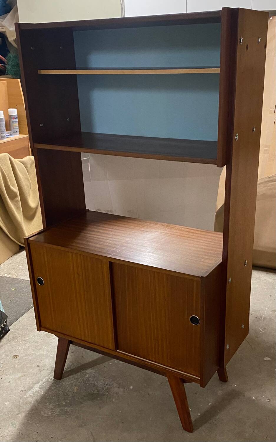 Vintage bookcase with compass feet from the 60s