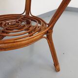 Vintage round smoked glass and rattan coffee table from the 70s
