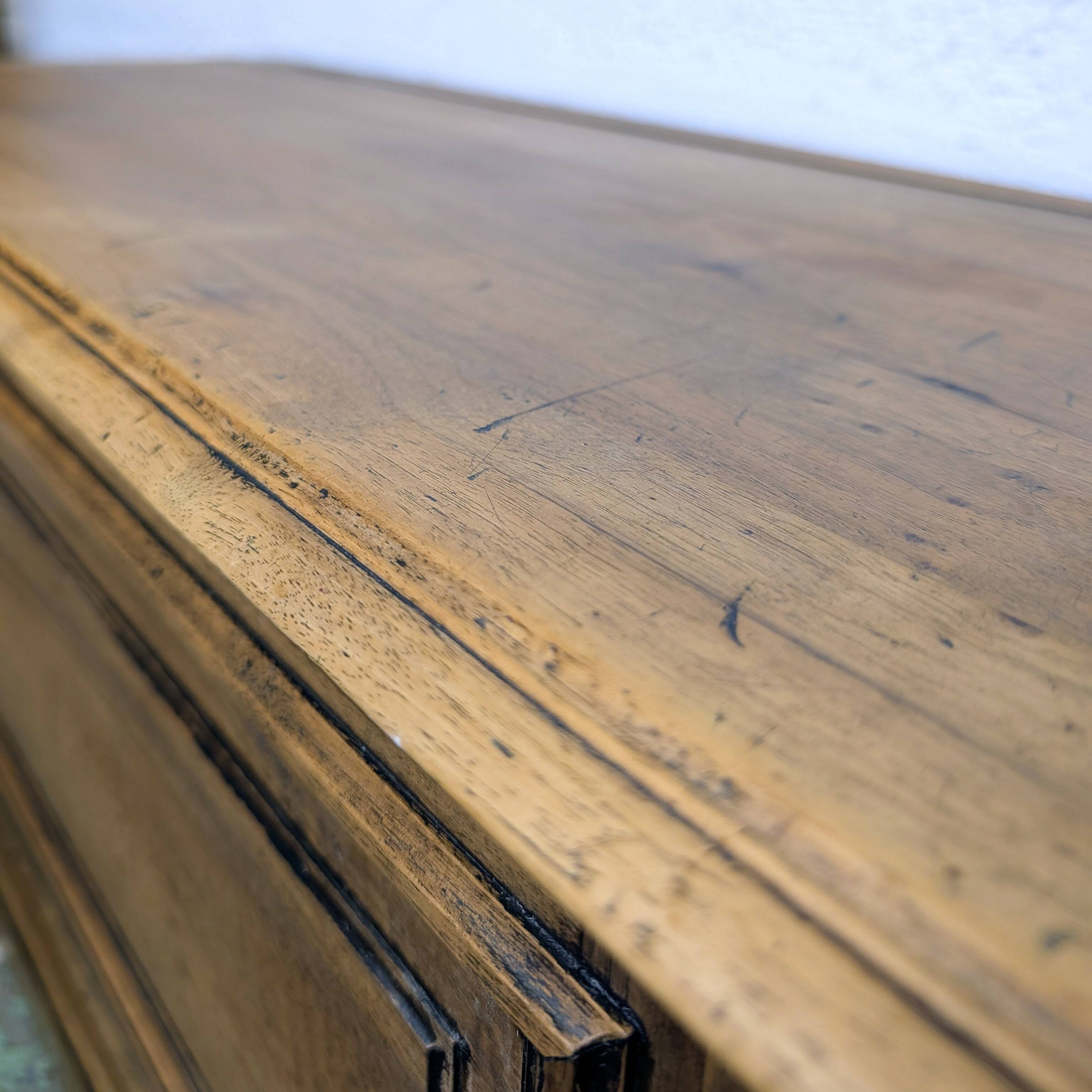 Antique wooden chest with moulded panels