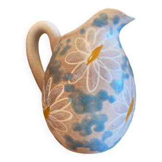 pitcher of daisies