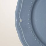 Set of 4 blue ceramic dessert plates.