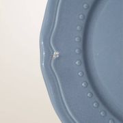 Set of 4 blue ceramic dessert plates.