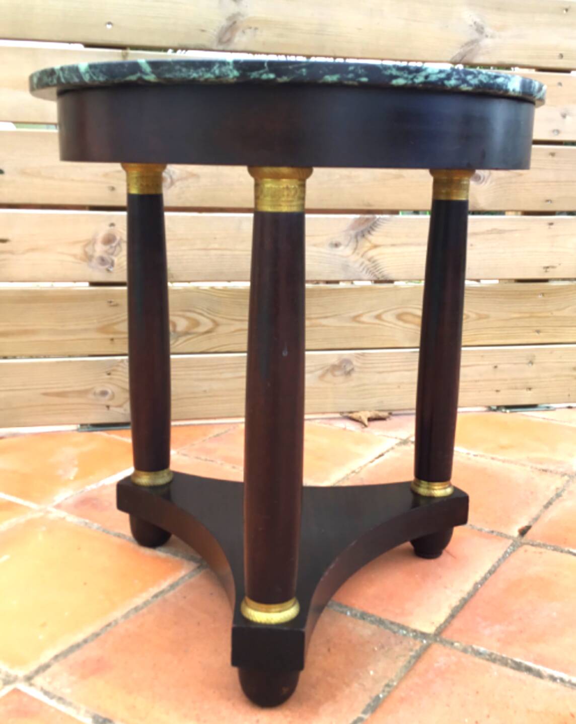 Empire period tripod pedestal table with sea green marble top and bronze ornamentation