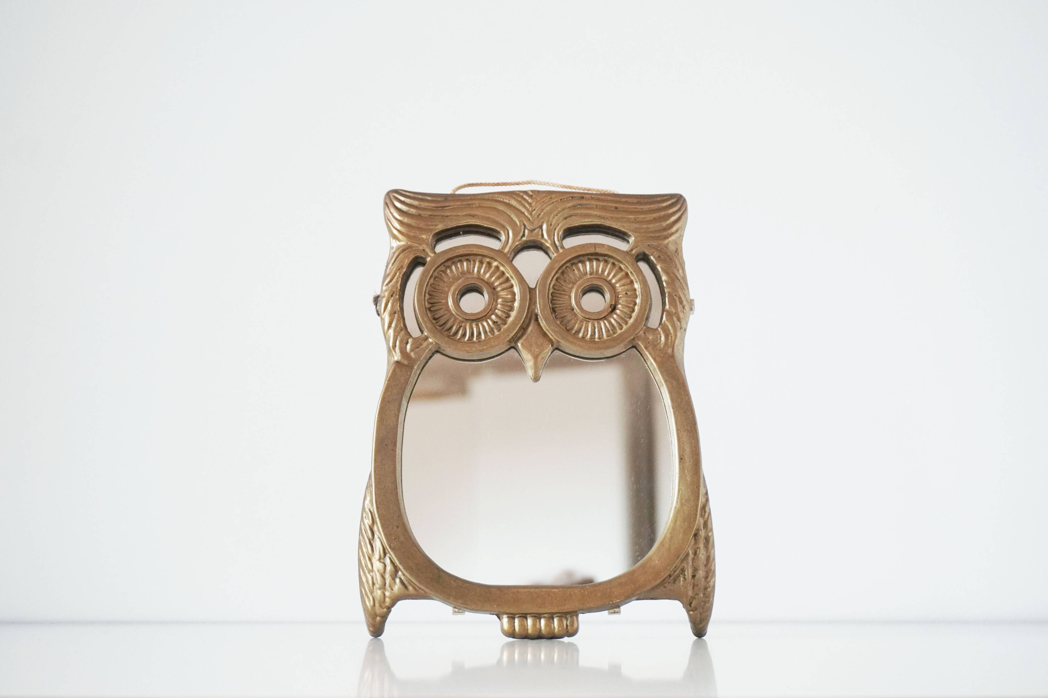 Brass owl mirror