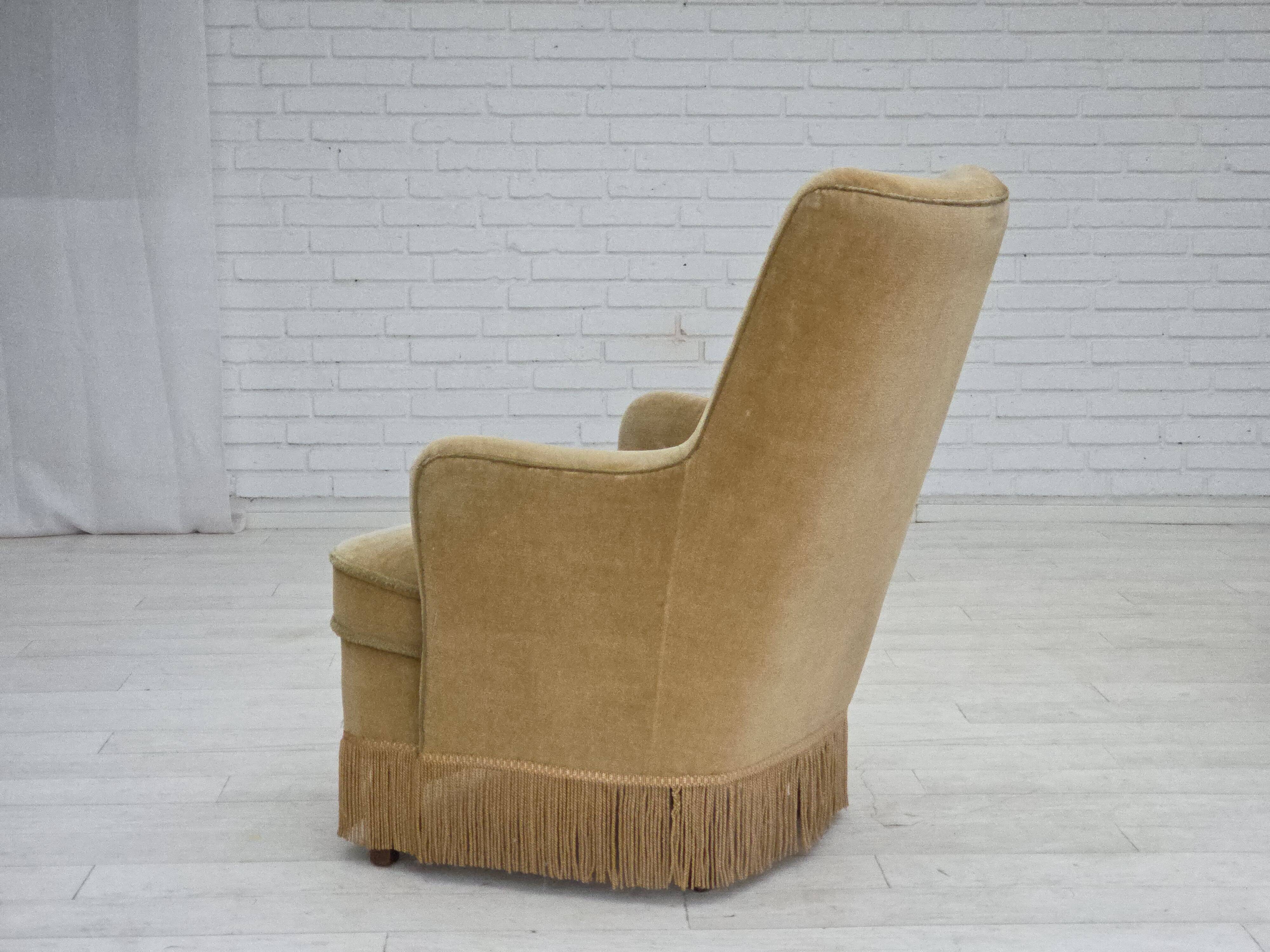 1970s, Danish armchair., original light green furniture velour.