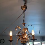 Vintage chandelier in golden metal
