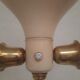 Tripod floor lamp - 1950s - wood and brass.