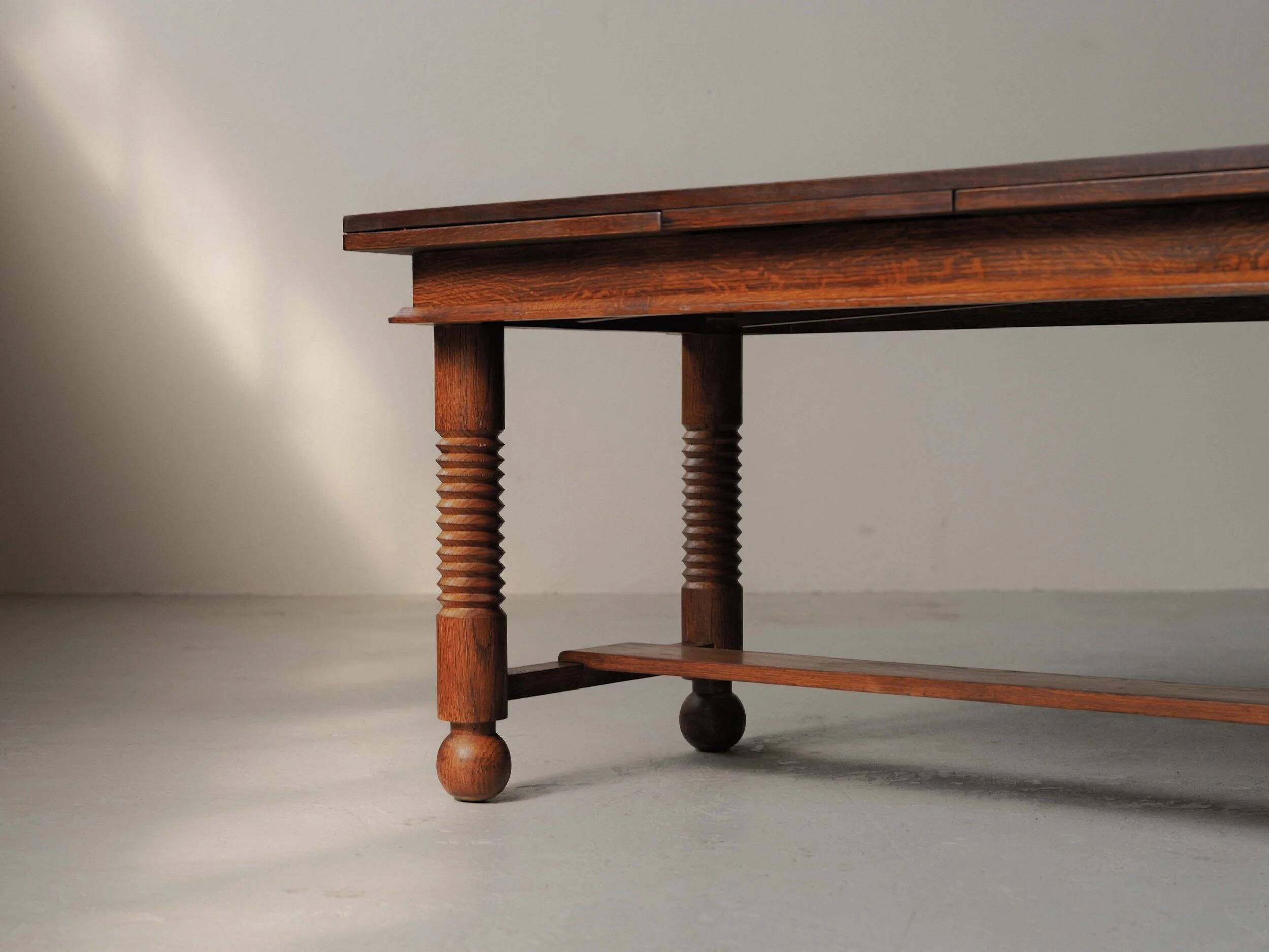 Modernist oak dining table, France, 1940–1950