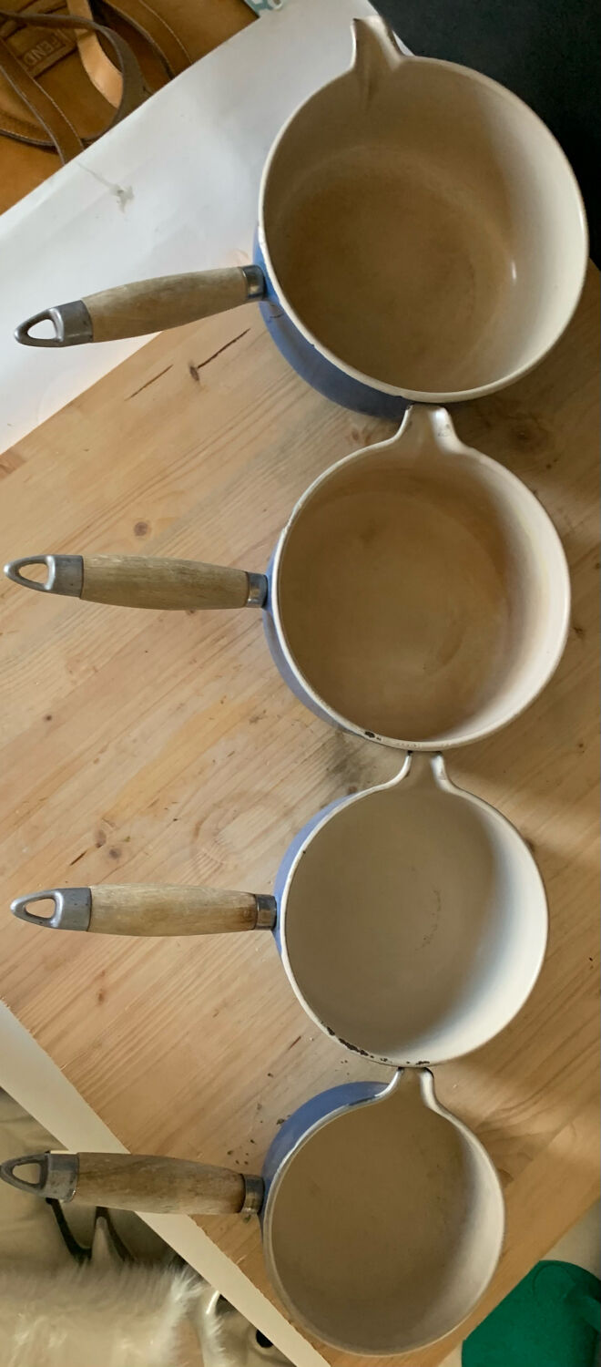 Series of cast iron pans Le Creuset bleues