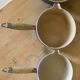 Series of cast iron pans Le Creuset bleues