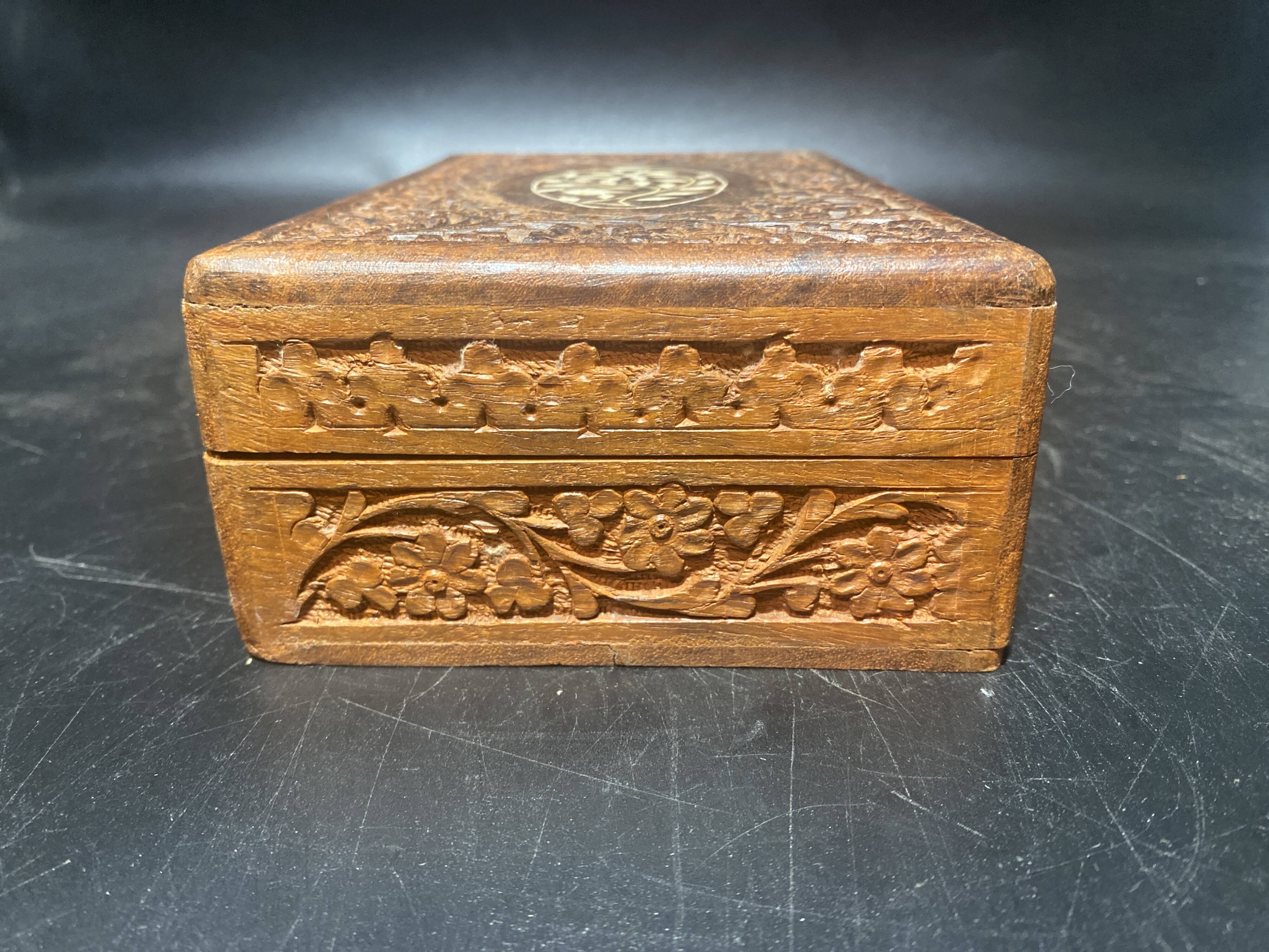 Carved wooden box