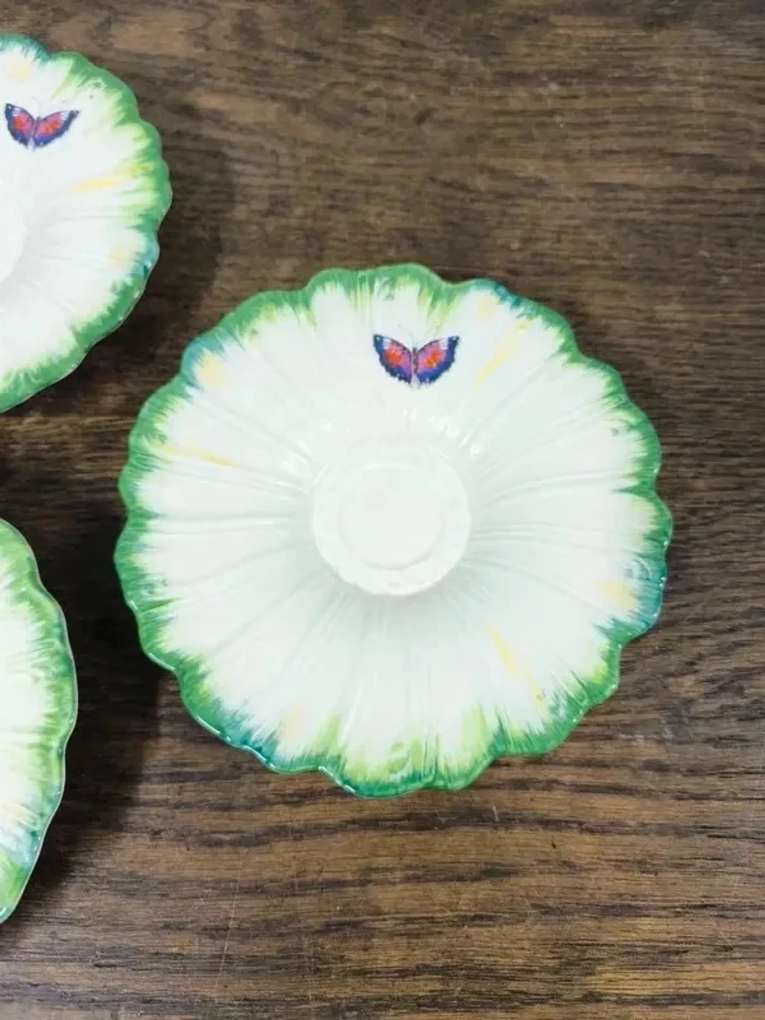 Set of 3 antique Lunéville butterfly saucers / saucers in barbotine.