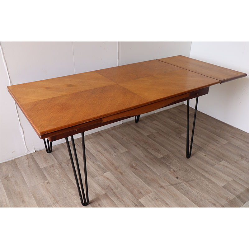 Vintage extendable dining table in wood and metal base, 1950