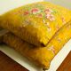 2 vintage ornate cushions