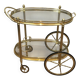 Oval brass trolley from Maison Baguès.