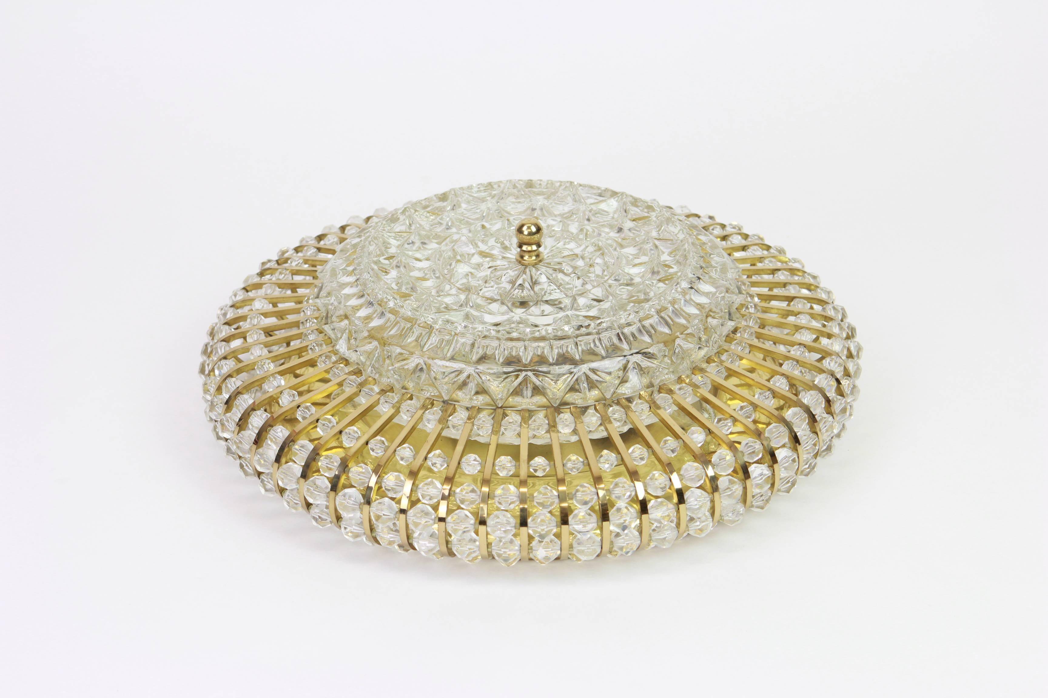 Hillebrand wall sconce in brass, glass, and Lucite beads, Germany, 1960s.