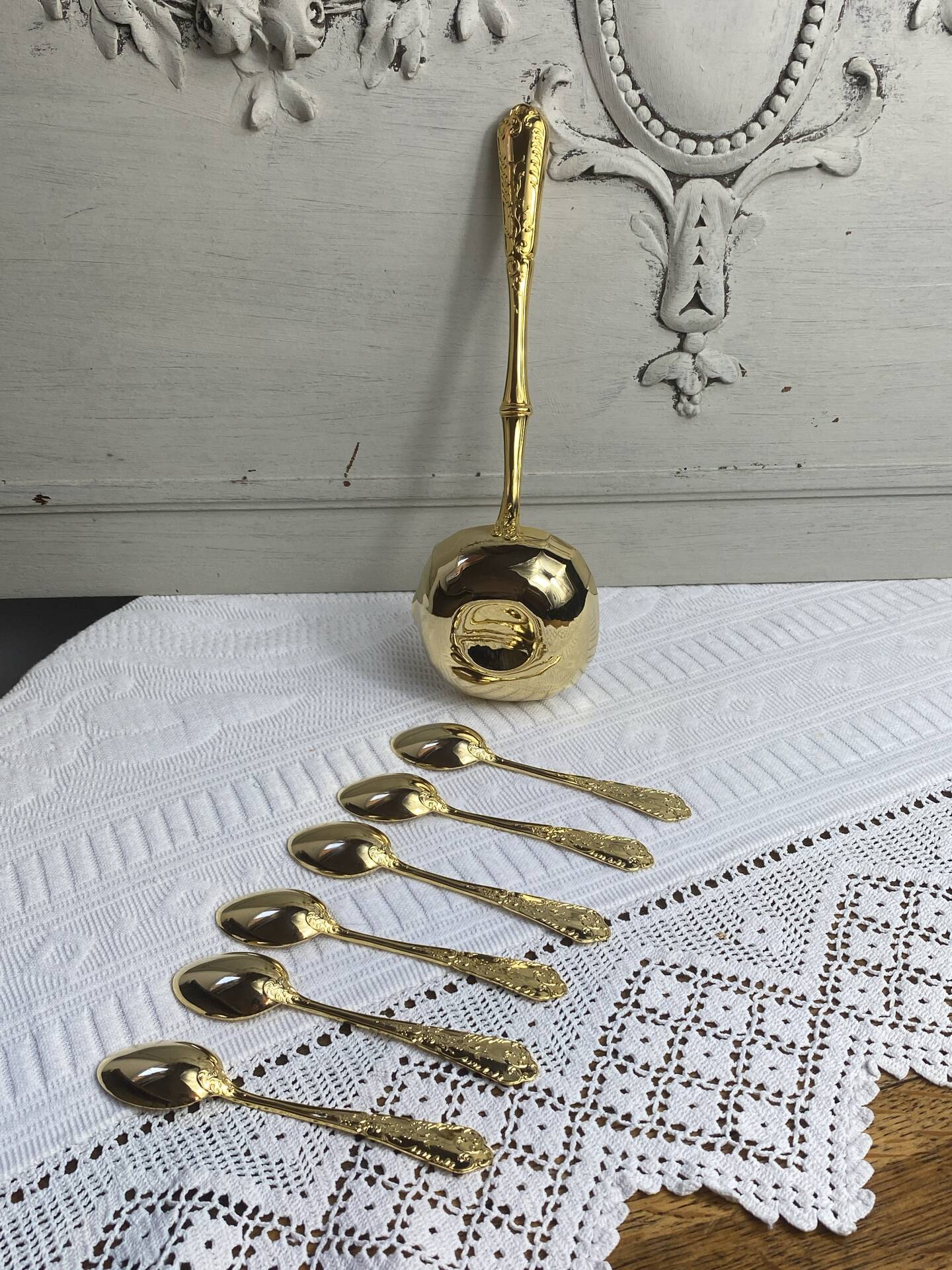 Dessert spoons and serving ladle