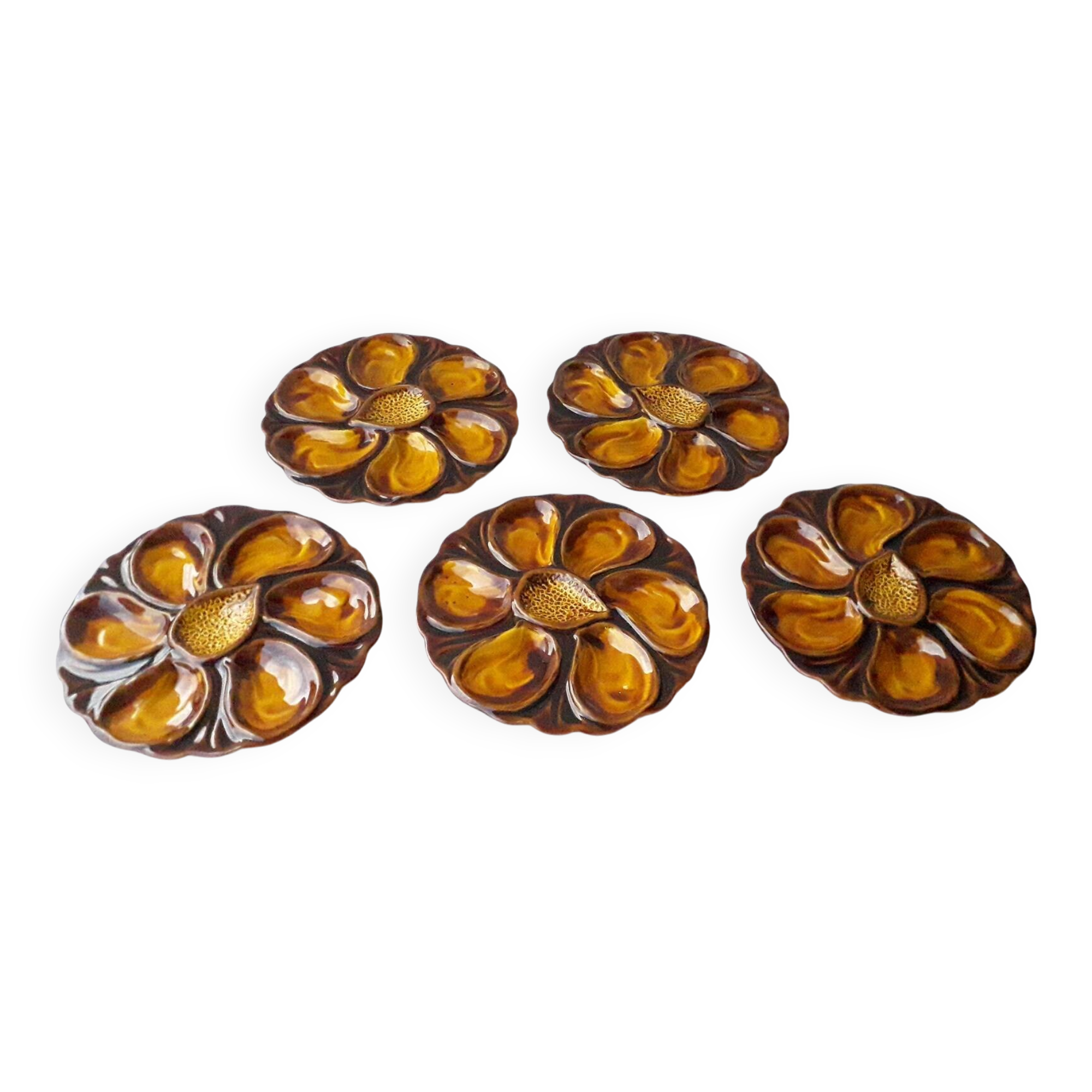 5 oyster plates in slipware