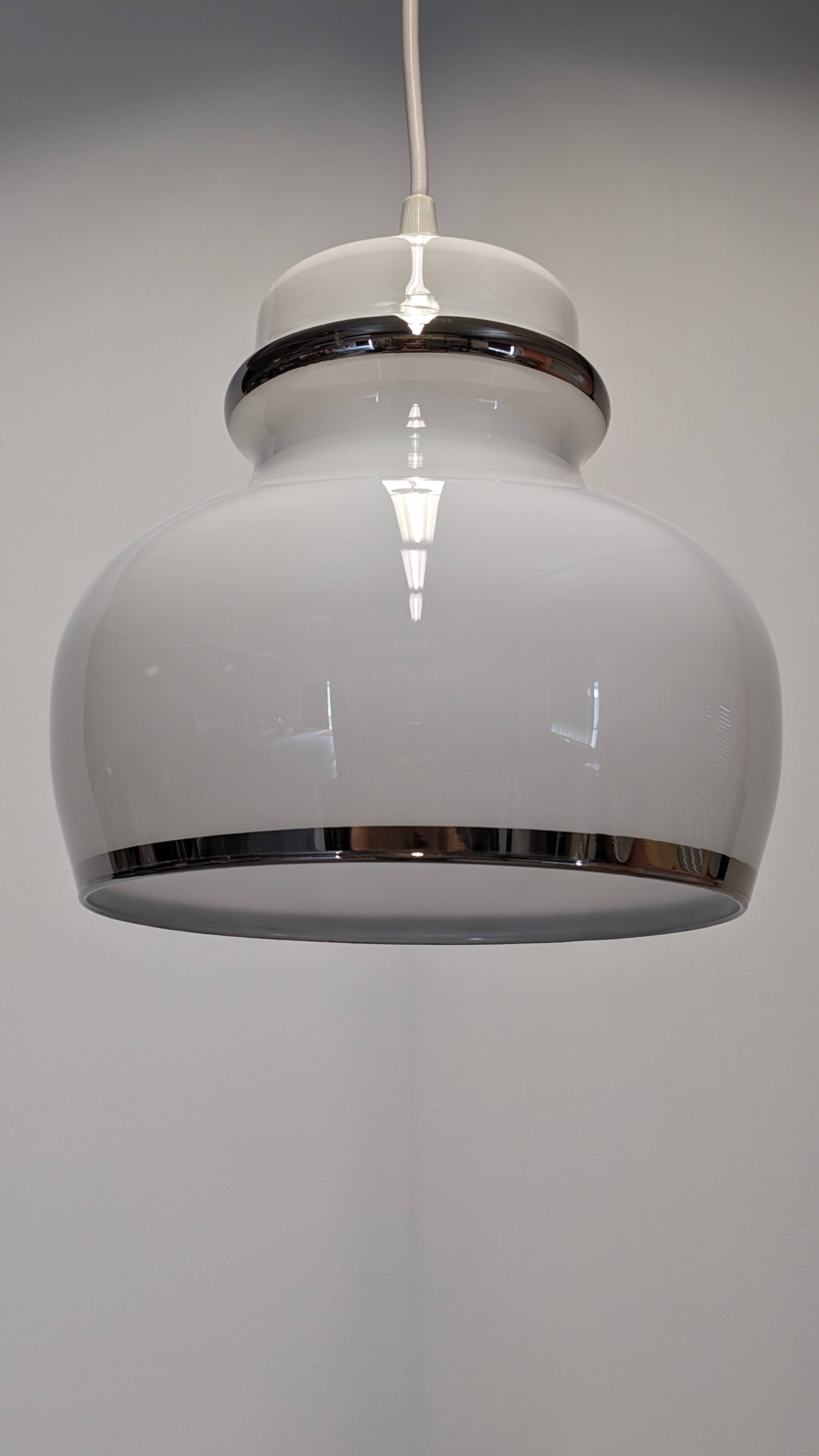 Suspension in white opaline with chrome trim, France circa 1970.