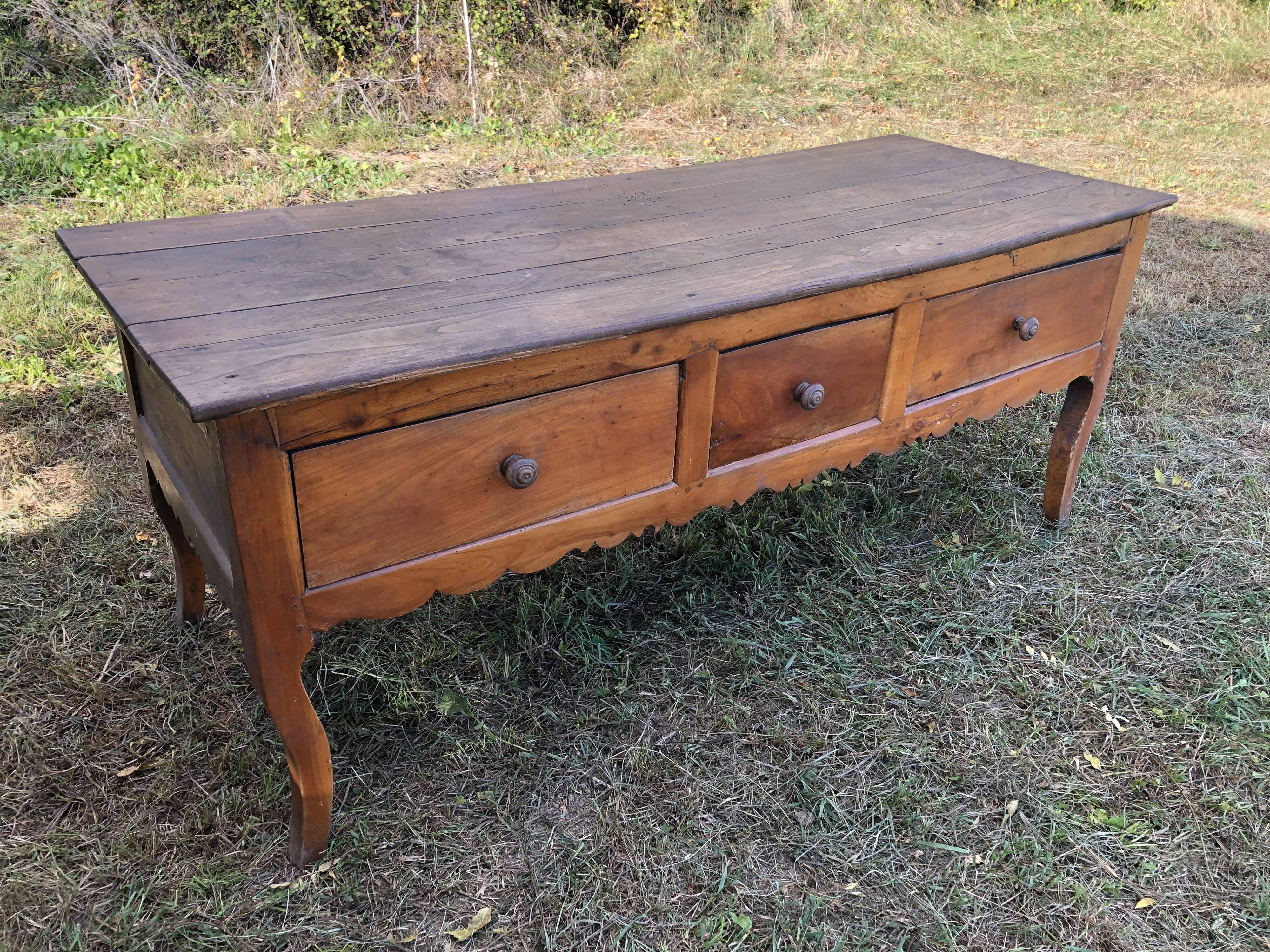 Antique Louis XV paneled table with 3 front drawers in solid cherry wood