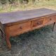 Antique Louis XV paneled table with 3 front drawers in solid cherry wood