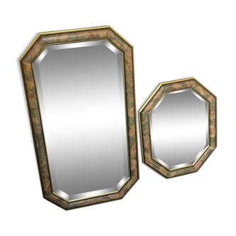 Two wooden mirrors with flower pattern