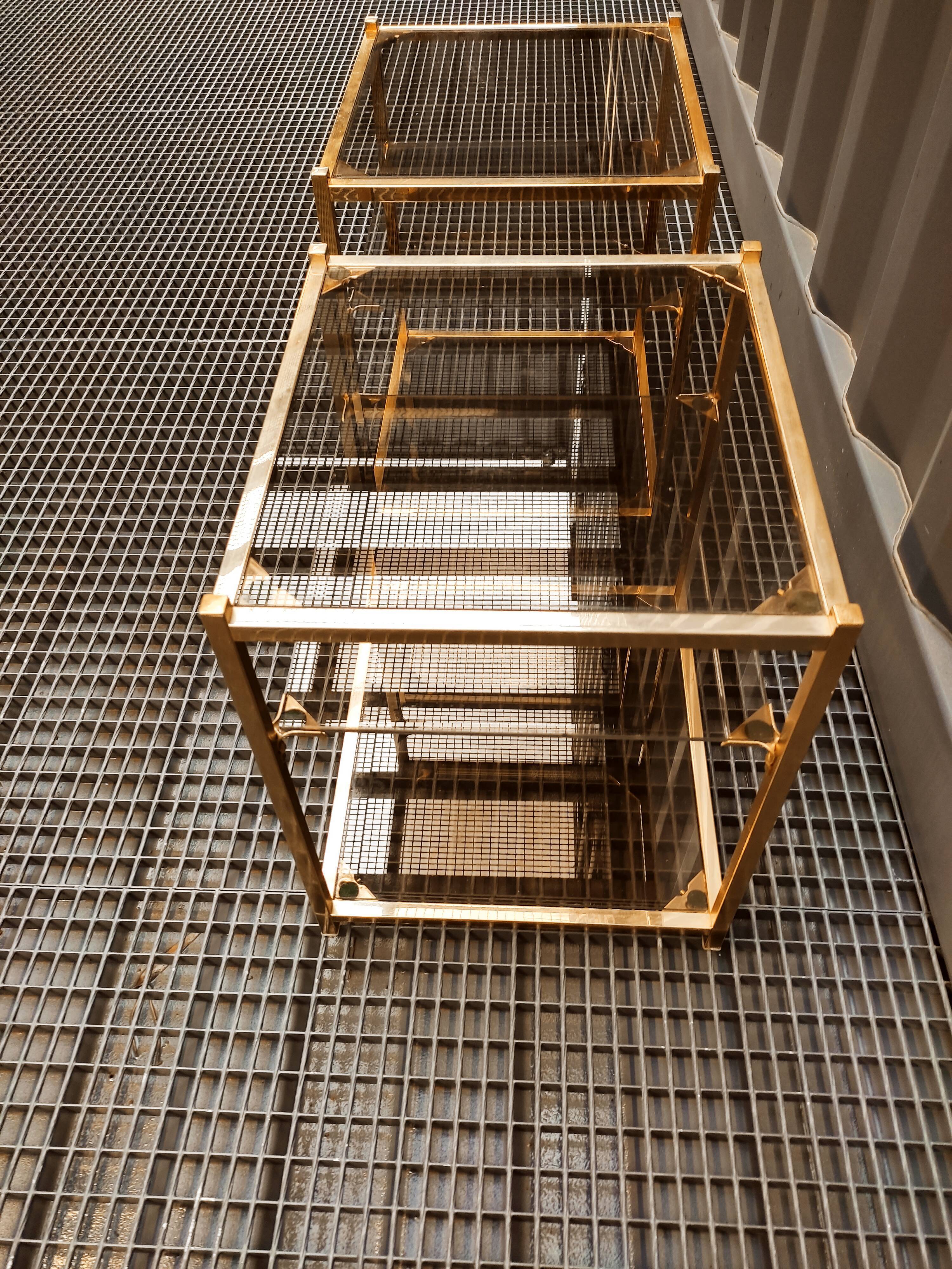 Sofa ends.in gilded metal and glass