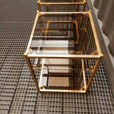 Sofa ends.in gilded metal and glass