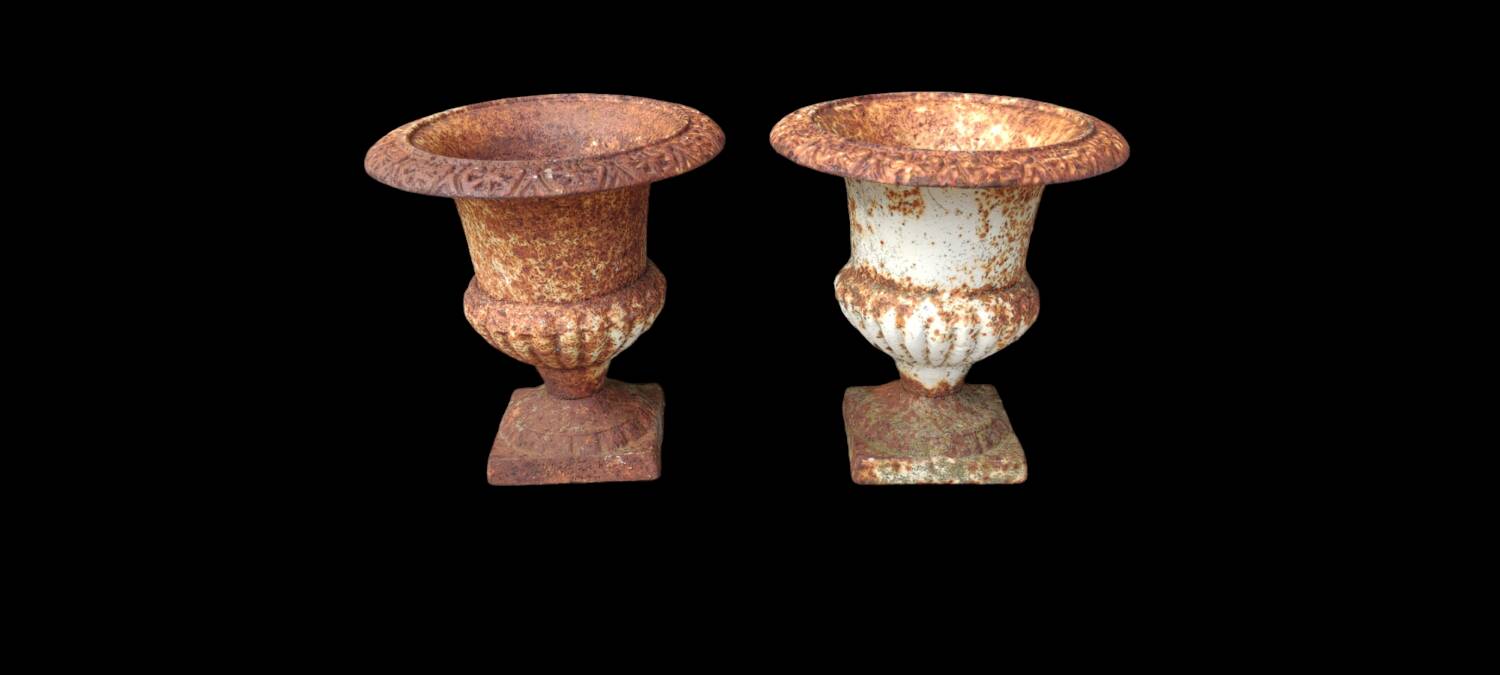 Pair of old small Medici cast iron vases