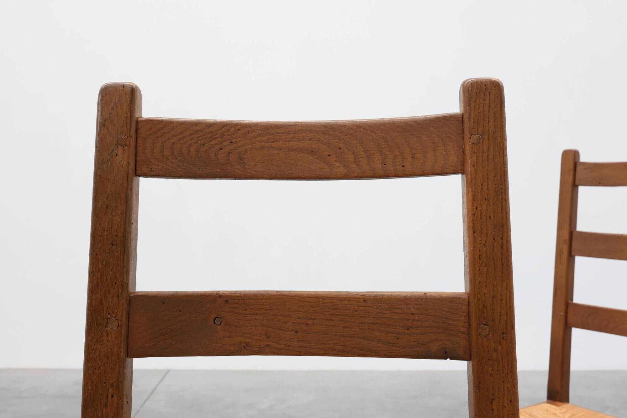Set of 6 rustic oak ladder-back chairs with rush seats, France, 20th centur