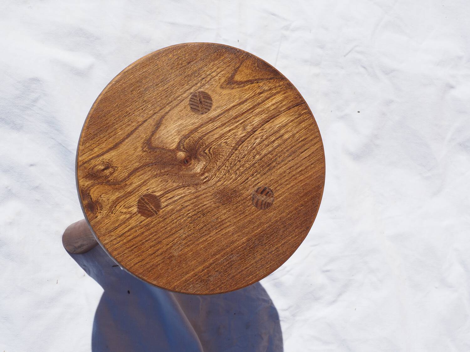 Old rustic milking stool