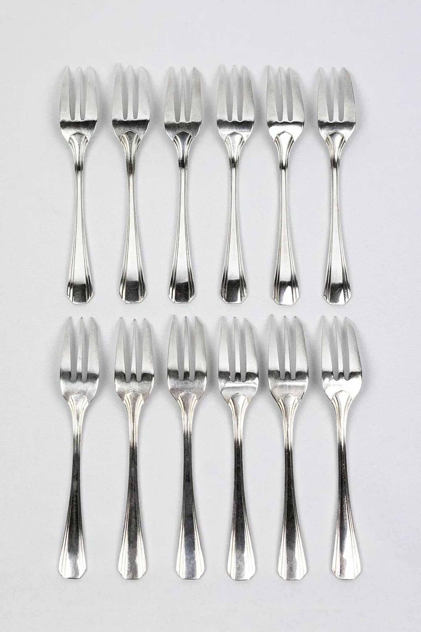12 dessert forks Christofle Boréal by Luc Lanel, silver-plated metal
