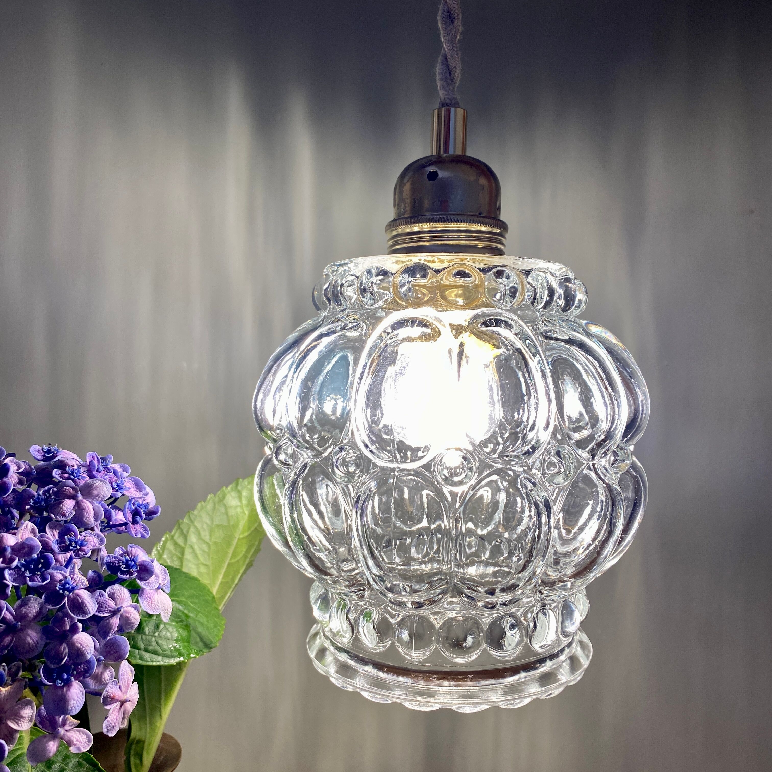 Vintage globe pendant lamp in transparent molded glass