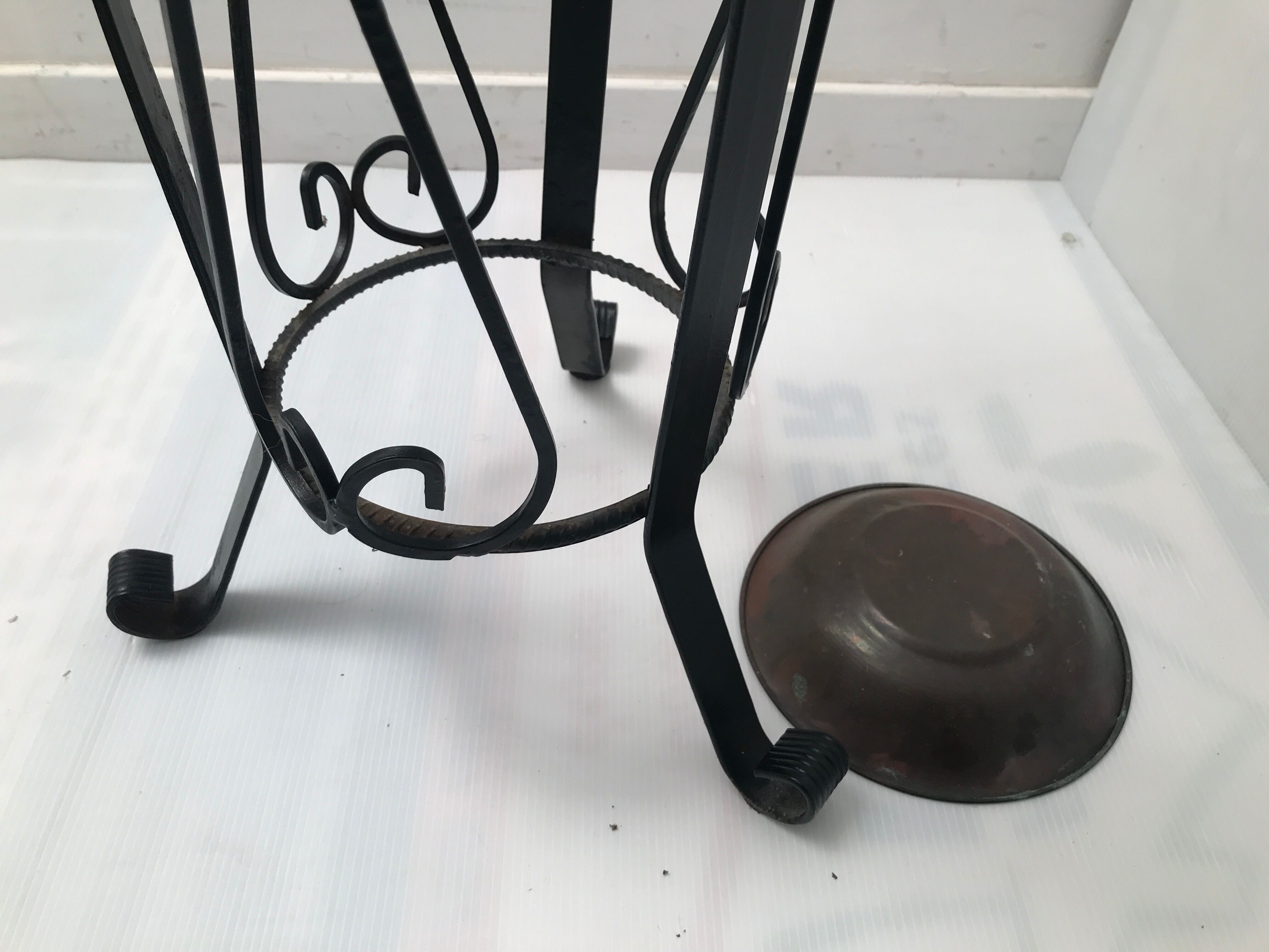 Wrought iron umbrella holder