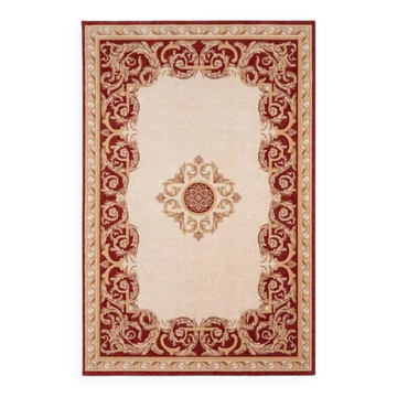 Red and beige oriental pattern rug aman