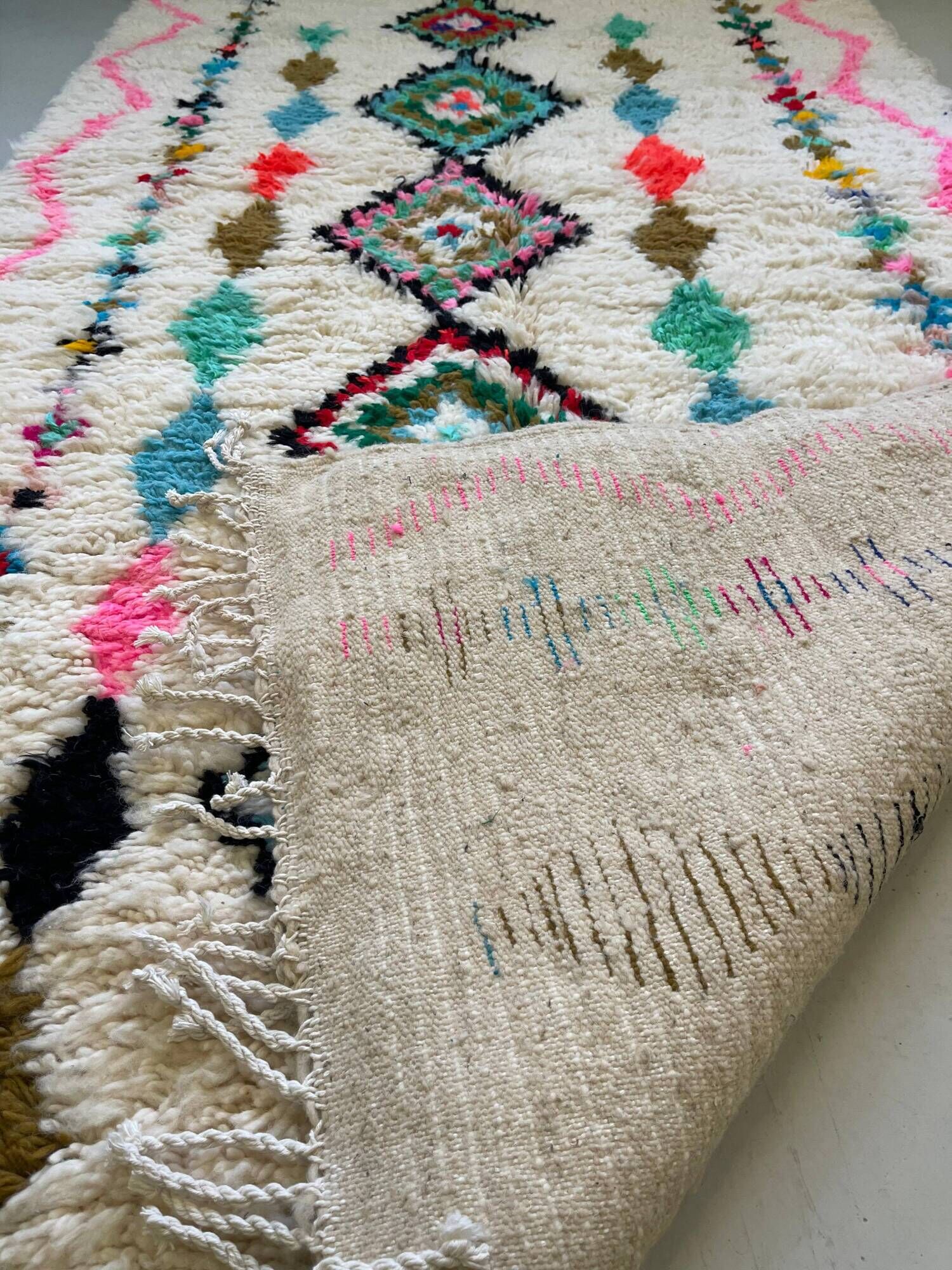 Moroccan Berber rug in ecru with multicoloured diamonds and bright pink – 240 × 139