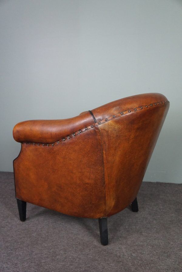 Leather club chair with black piping